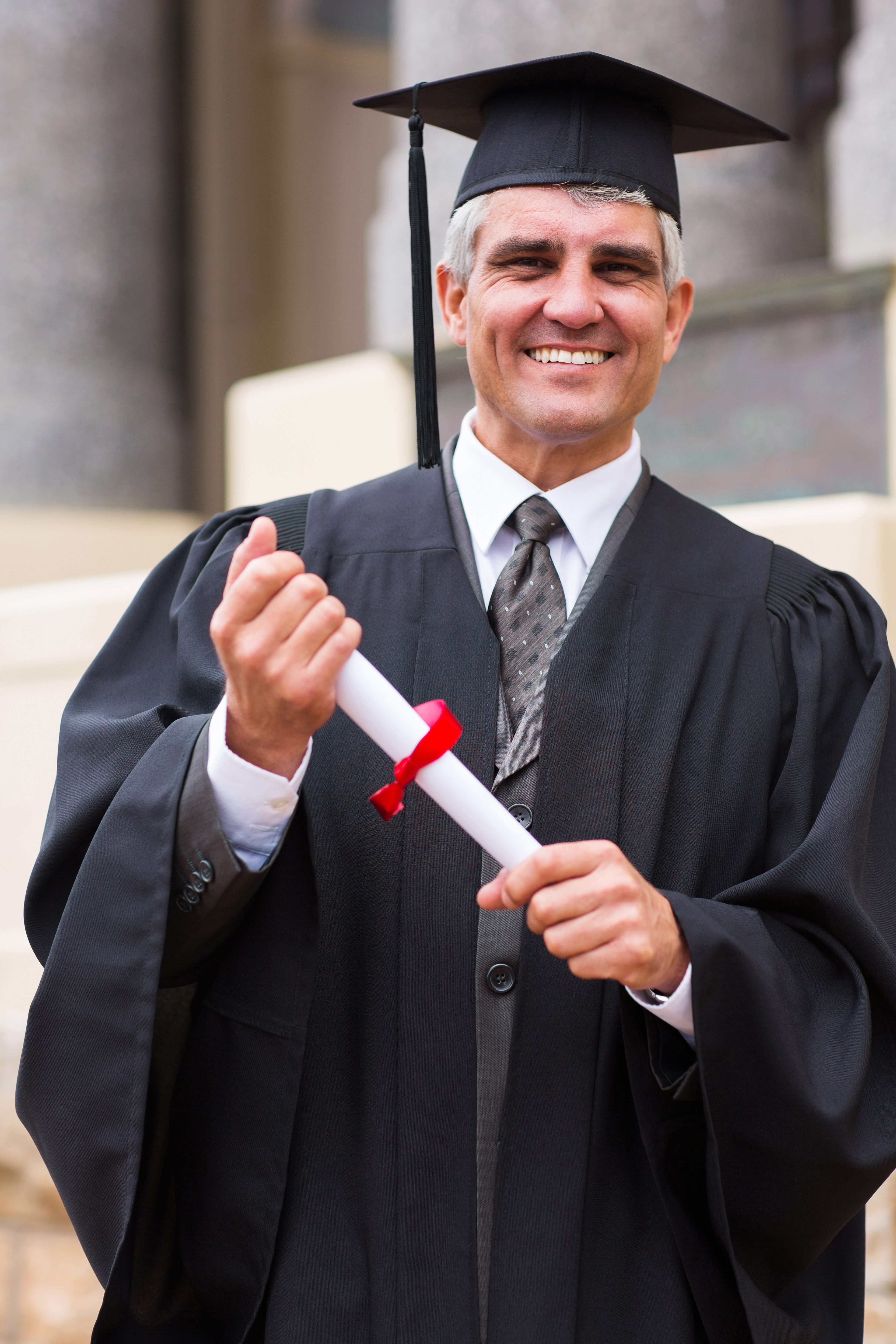middle aged male graduate
